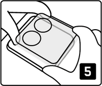 Align the glass straight down over the lens. Then gently remove the mounting frame